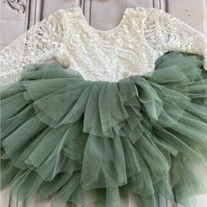 Brand new Sage green flower girl dress with added belt